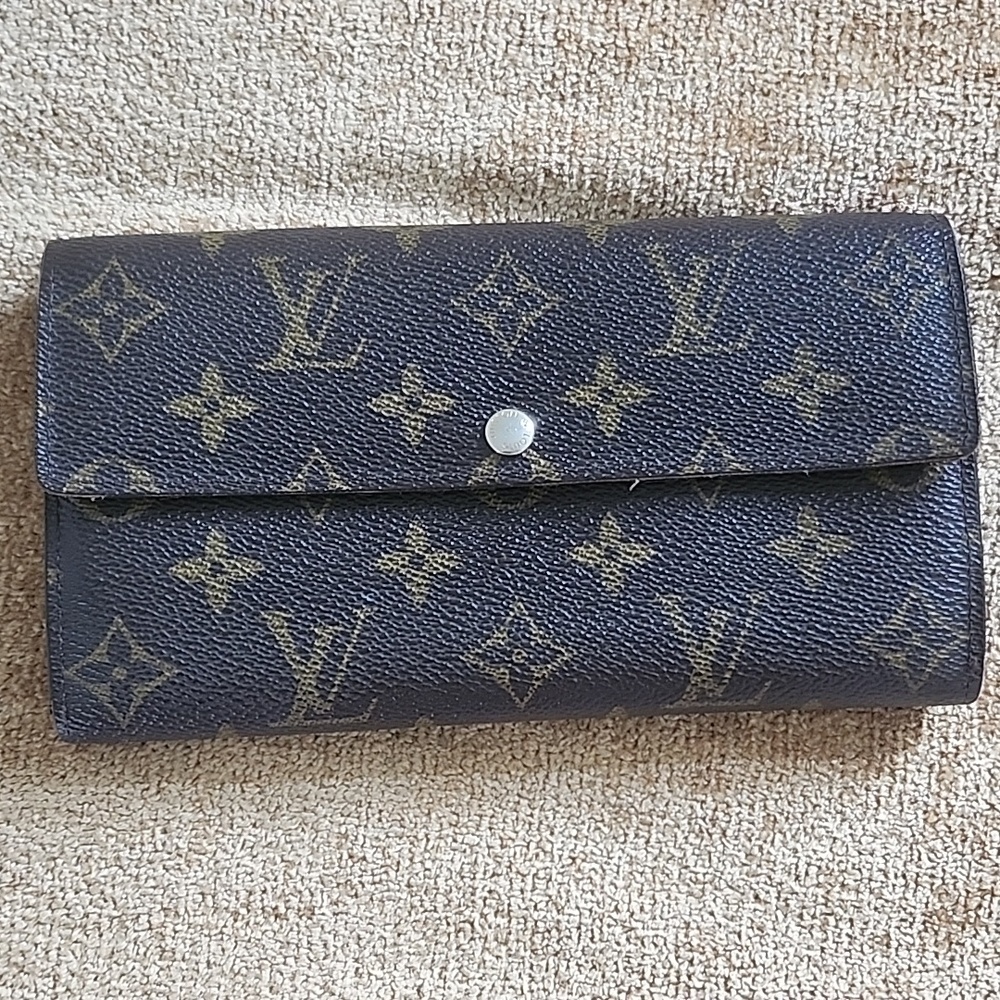 Louis Vuitton classic Sarah wallet.